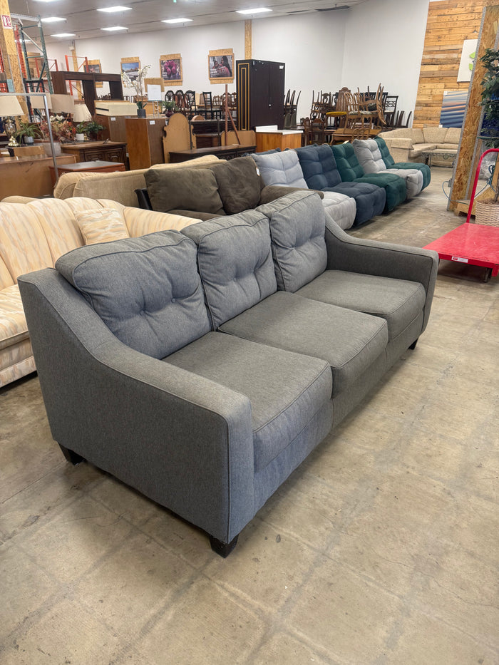 Grey Tufted Three-Seater Sofa