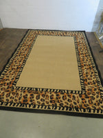 6Ft 1In x 8Ft 10In Area Rug - Brown, Black and Beige