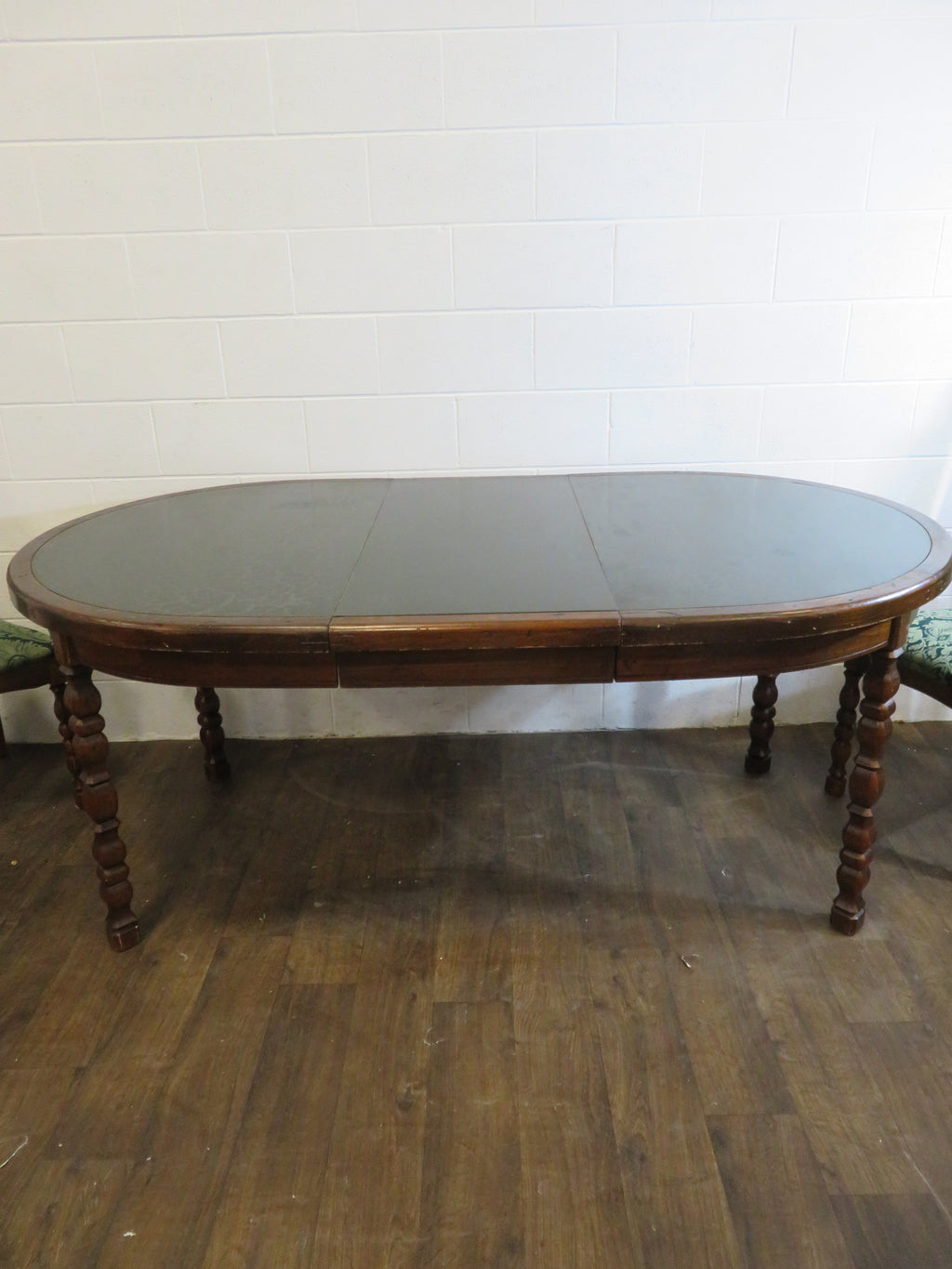 Wooden Dining Table with Inlaid Leather Top and Six Chairs and one Leaf