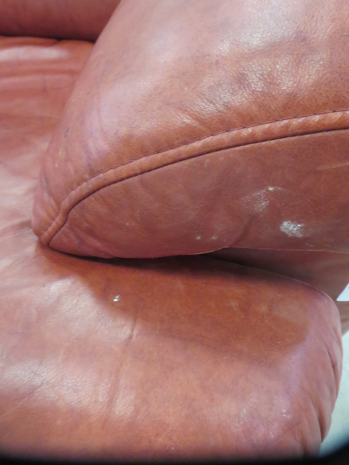 64"W Brown Leather Love Seat
