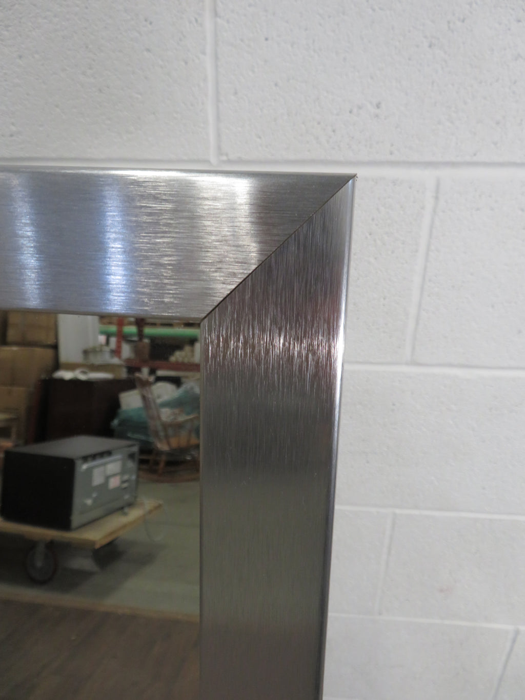 Wall Mirror Framed in Stainless Steel - 27.5" x 27.5"