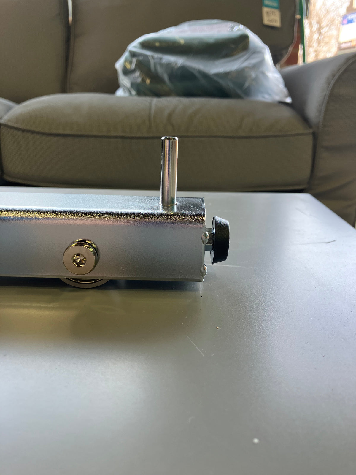 Roller Assembly with Brake for Sliding Storage Shelves