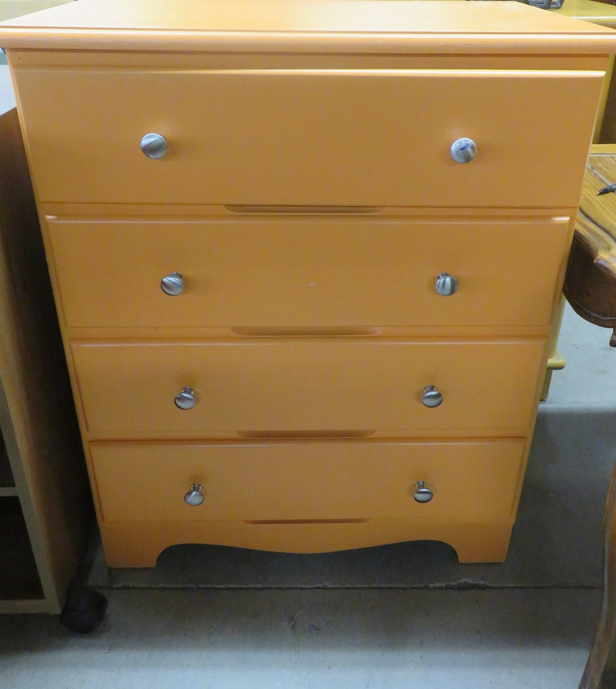 Light Orange Four Drawer Dresser