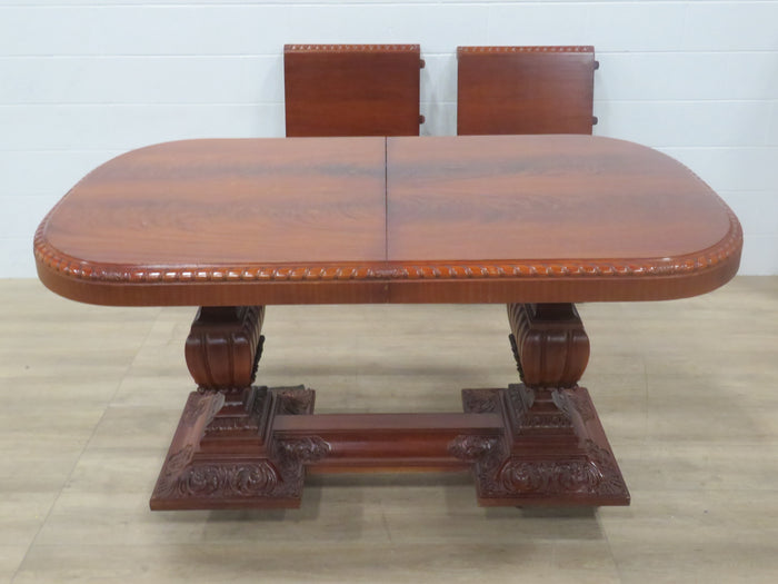 Wood Dining Table with Ornate Detailing and 2 Leaves