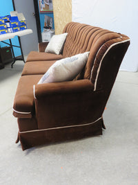 Vintage-style brown velvet sofa