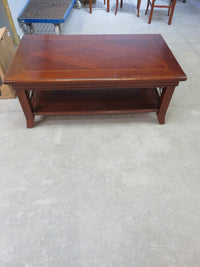 Traditional-style wood coffee table