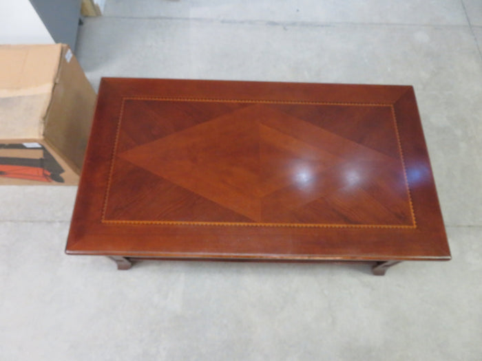 Traditional-style wood coffee table