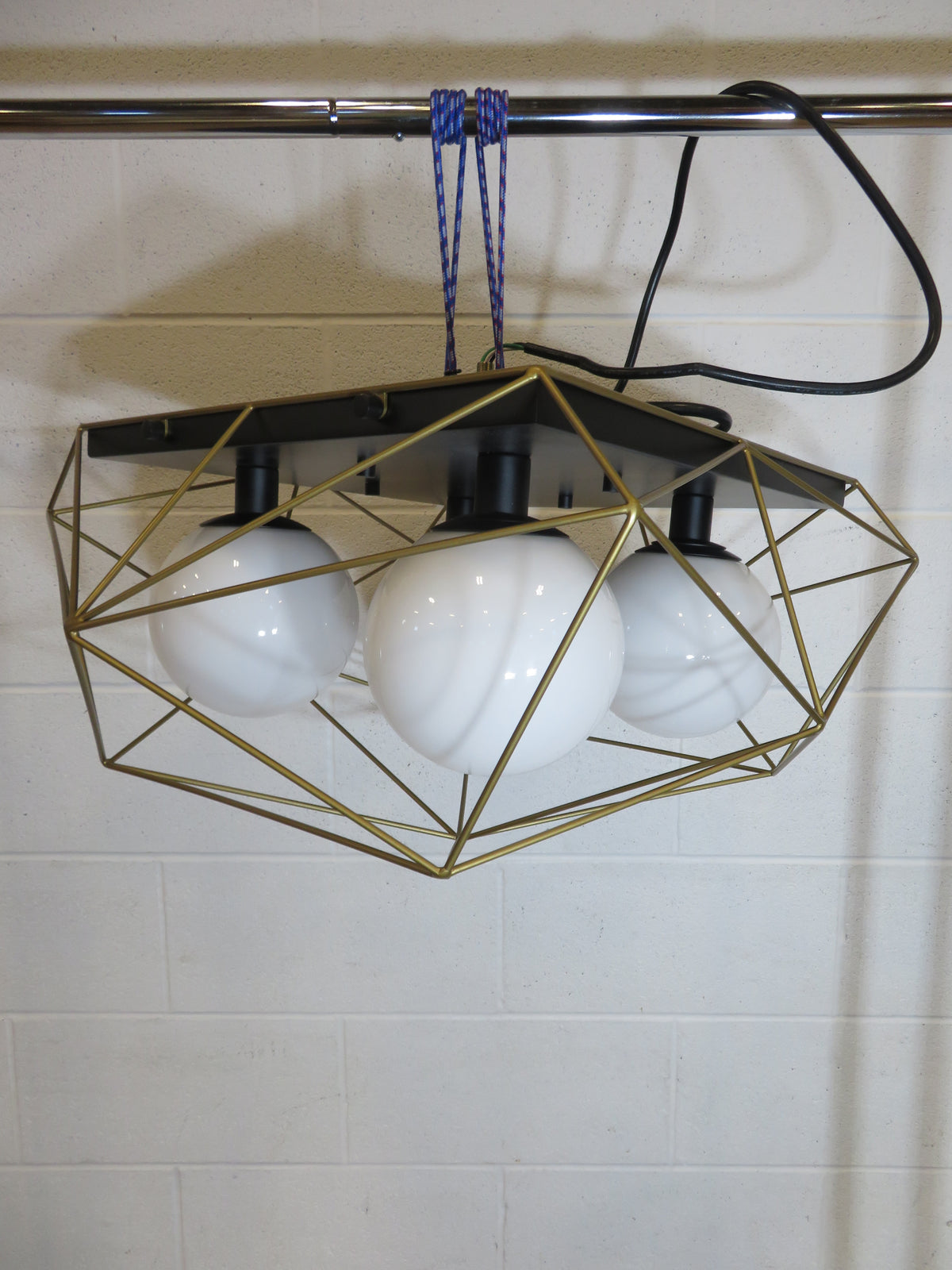 Four Light Flush Mount - Black and Brass