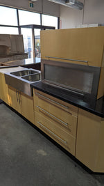 Angled Honey Maple Kitchen with Black Stone