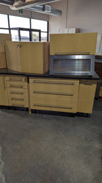 Angled Honey Maple Kitchen with Black Stone
