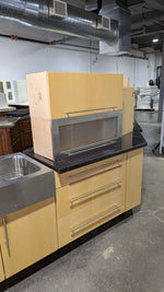 Angled Honey Maple Kitchen with Black Stone
