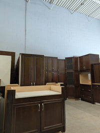 Chocolate Brown Kitchen with Birdcage Accents