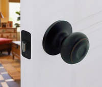 Defiant Hartford Aged Bronze Hall/Closet Passage Door Knob