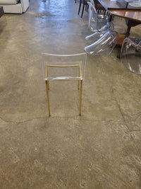 Clear acrylic with light Steel legs with gold finish