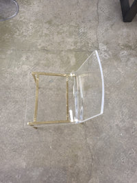 Clear acrylic with light Steel legs with gold finish