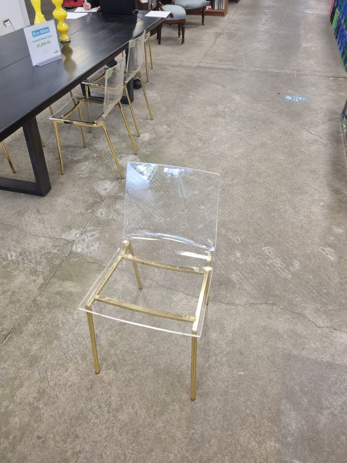 Clear acrylic with light Steel legs with gold finish