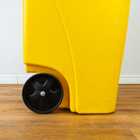 Yellow Rubbermaid Trash Can with Wheels -  50 Gallon