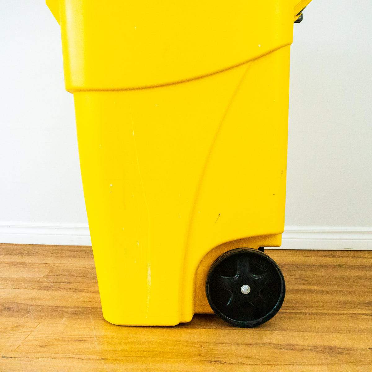 Yellow Rubbermaid Trash Can with Wheels -  50 Gallon