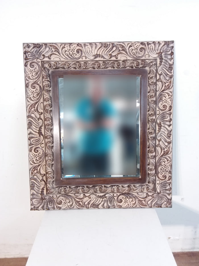 Ornately Framed Beveled Mirror