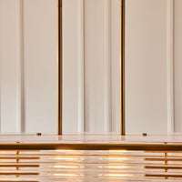 GlucksteinElements Plaza 4-Light 60W Brass Chandelier with Clear Reeded Glass Shade