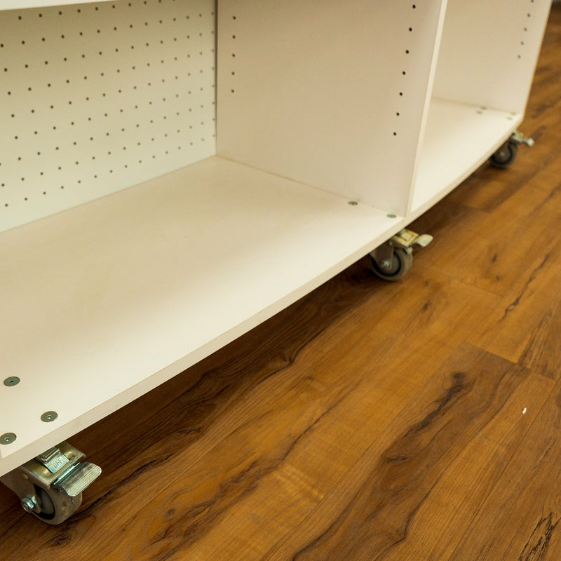 White Curved Shelving Unit With Wheels