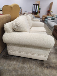 Light Cream Floral Loveseat with 2 Striped Cushions