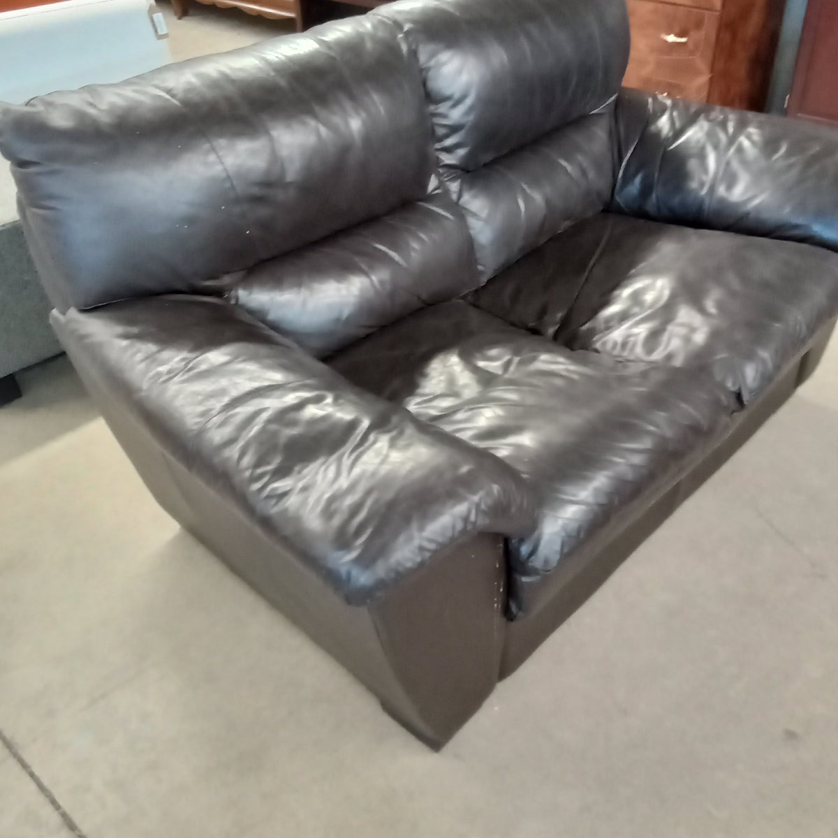 65"W Black Leather Love Seat