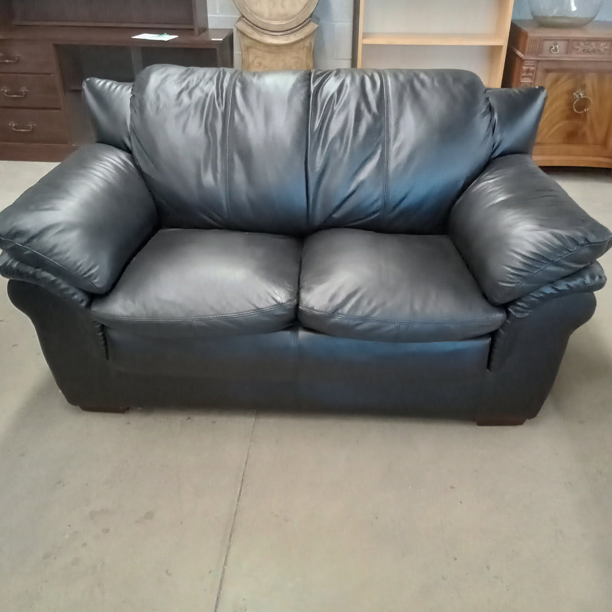62"W Love Seat in Black Faux Leather