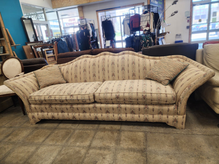 Camelback Floral Sofa with 2 Decorative Cushions