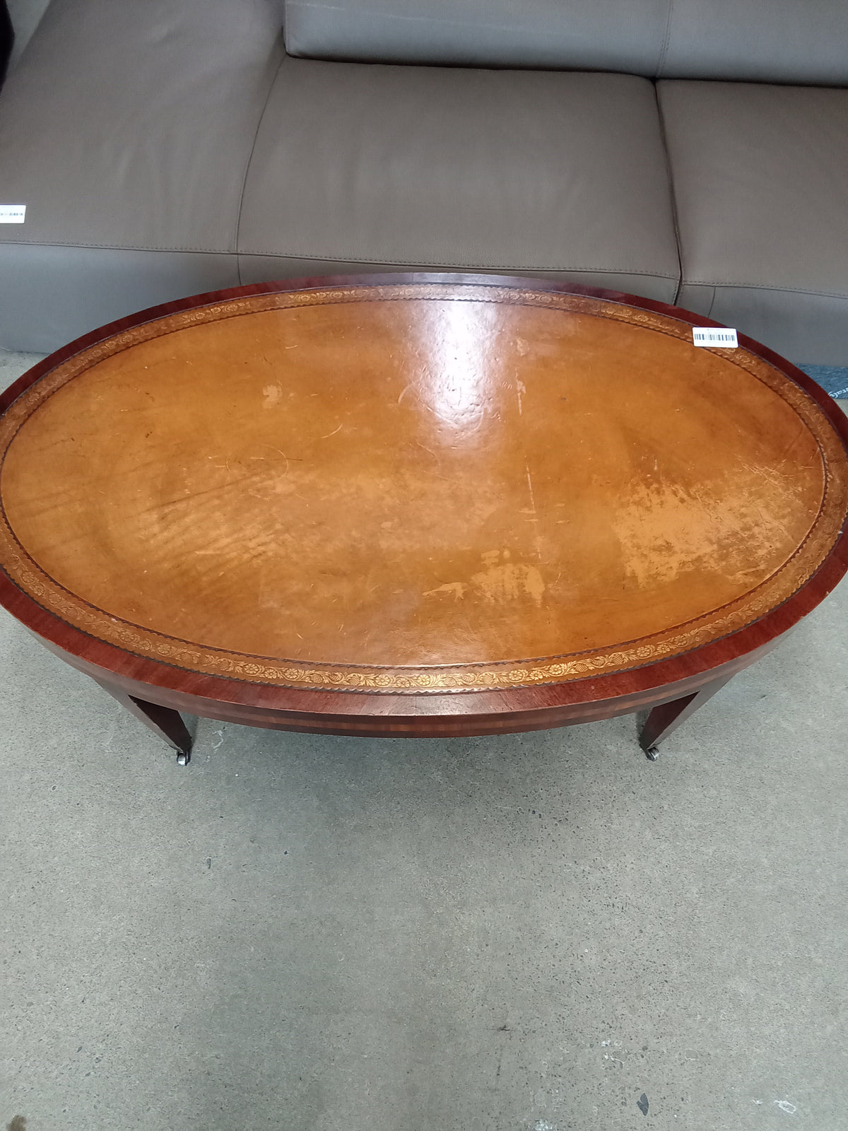 44"W Oval Coffee Table with Leather In-Lay