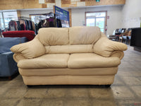 Plush Cream Faux Leather loveseat