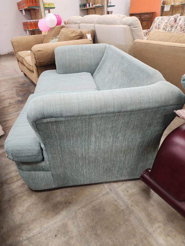 Light Blue Loveseat with Matching Cushions