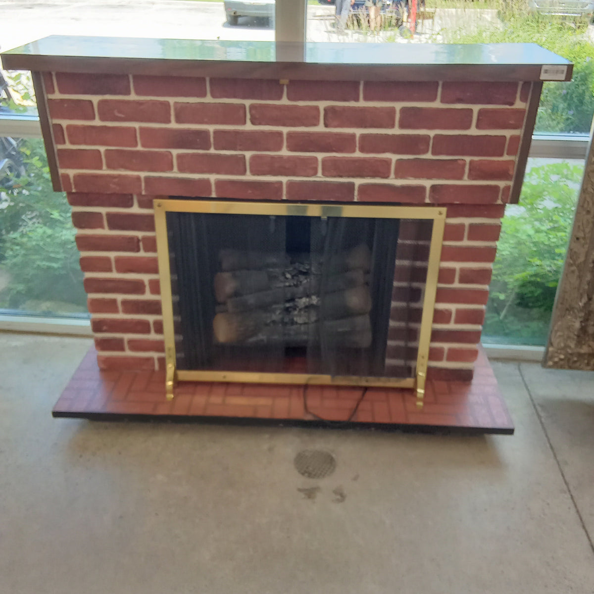 54.5"W Electric Fireplace and Faux Brick Mantle