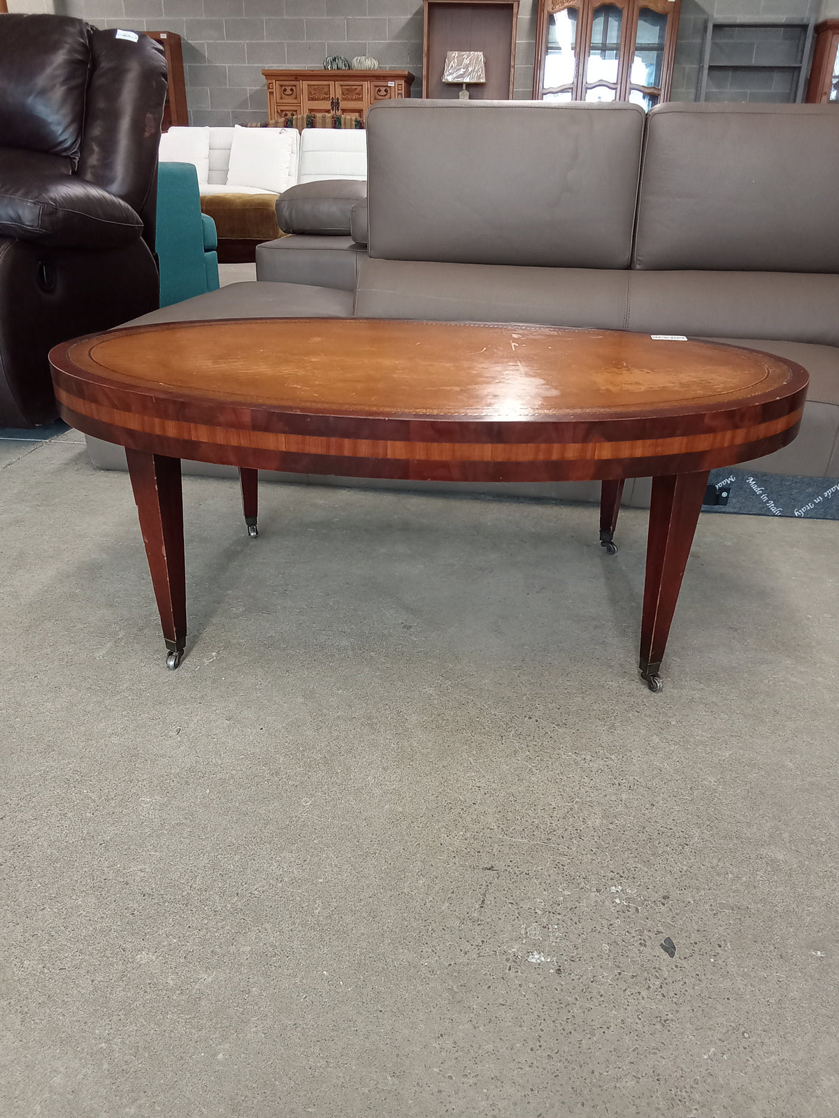 44"W Oval Coffee Table with Leather In-Lay