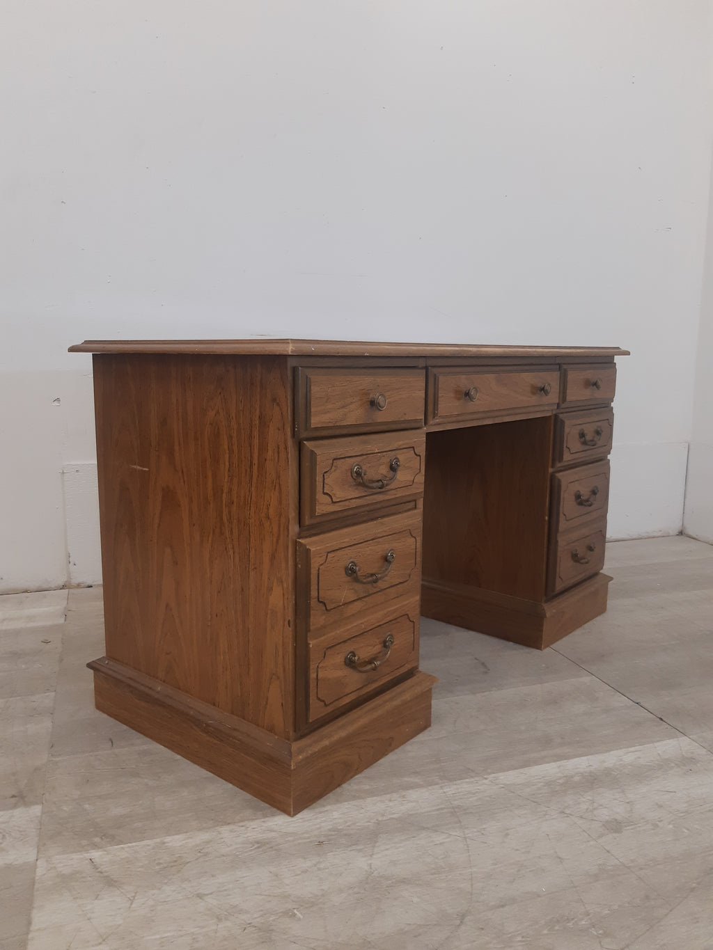 53" Seven Drawer Solid Wood Desk