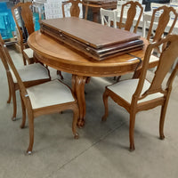 60"W Dining Table with 8 Chairs and 4 Leaves