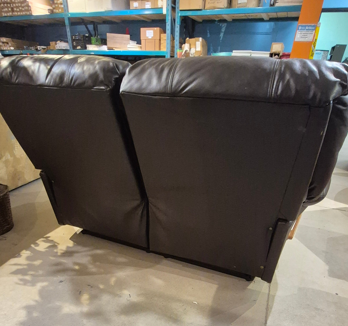 Brown Leather Manual Reclining Loveseat - - 1 side only reclines