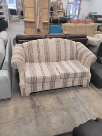 Neutral Cream Loveseat With Muted Vertical Stripes