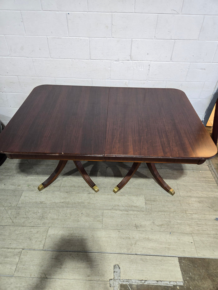 Dark-Wood Dining Table With Pedestal Legs
