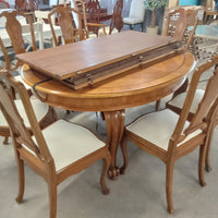 60"W Dining Table with 8 Chairs and 4 Leaves