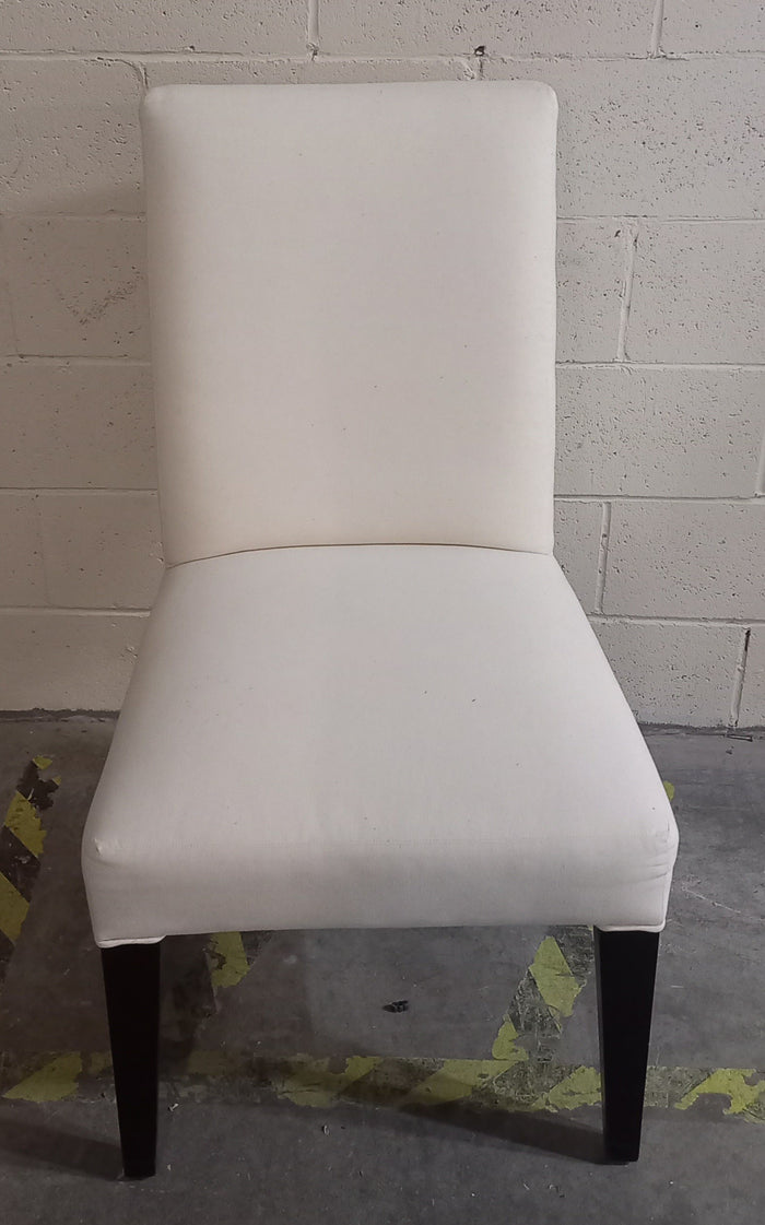 Set of Four White Dining Chairs w/ Chair Covering