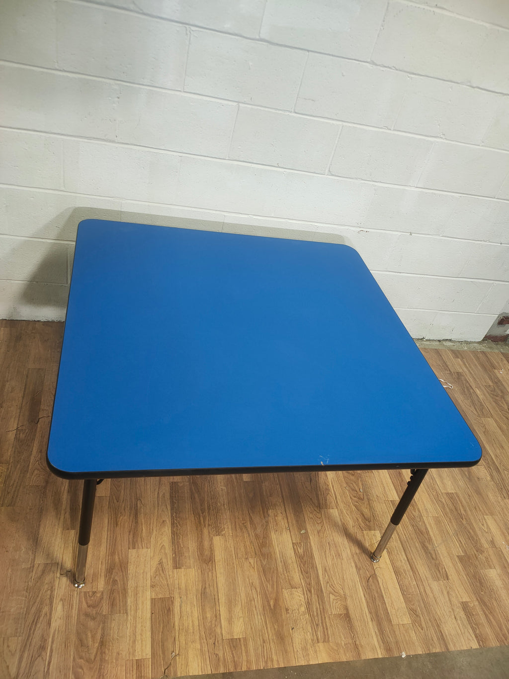 Blue and Black Adjustable Table
